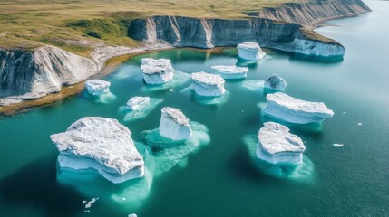 Climate crisis visual: fragmented icebergs floating in shallow Arctic water 