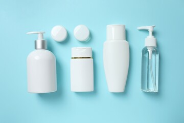 Natural cosmetic products a blue background, top view
