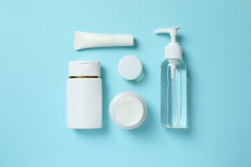 Natural cosmetic products a blue background, top view