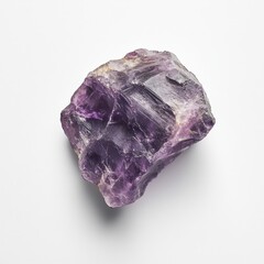 Fototapeta premium A piece of raw, unpolished amethyst with its deep purple hues and rough, crystalline texture, isolated on a white background - Generative AI