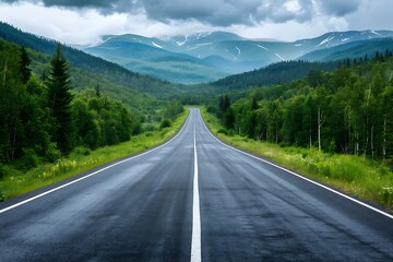Scenic Mountain Road with Lush Green Forest and Cloudy Sky
