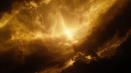 Golden clouds illuminated by a bright light in a dramatic sky.