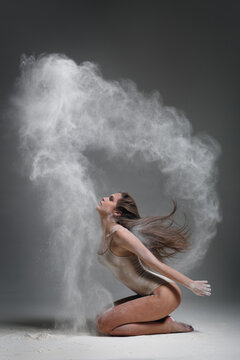 Dancing in flour dancer posing on a studio background