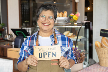 Asian elderly, senior, pensioner, female open cafe restaurant small business at home town after...
