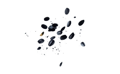 Flying black gold and grey seeds in motion, cut out