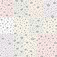 small black crowns scattered across a light pink background.