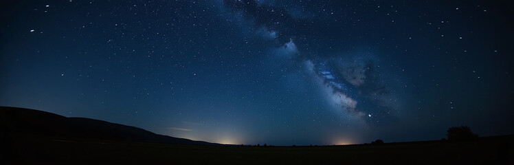 Fototapeta premium Dark Skies Illuminated By A Vast Canvas Of Twinkling Stars In The Serene Night Landscape Above. 00002