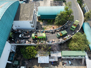Aerial View of Waste Collection and Garbage Trucks  

