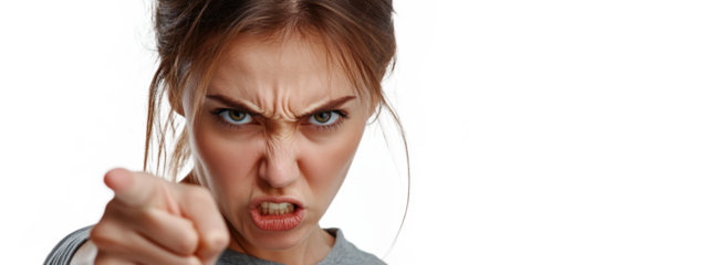 A young woman with an angry facial expression and pointing a finger at the camera. Transparent background