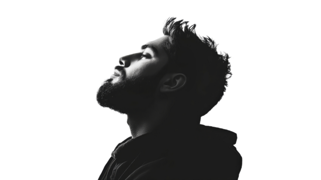 Profile of a man against a white background