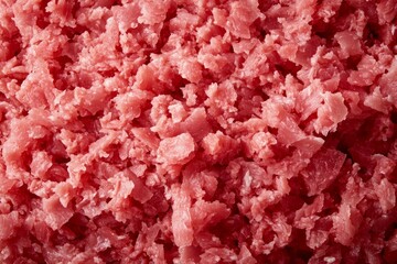 Fototapeta premium Raw minced meat texture close-up with pink tones. AI image