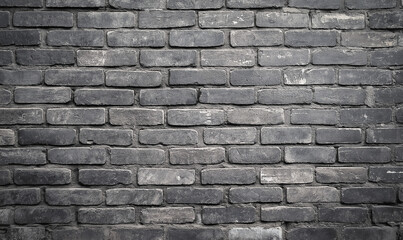 Obraz premium Cool Gray Brick Wall with Subtle Texture, Ideal for Urban or Industrial Style Spaces