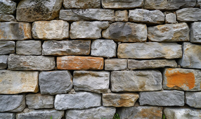 Obraz premium Rustic wall crafted from weathered stone bricks evoking timeless charm for artisanal stock photo collections