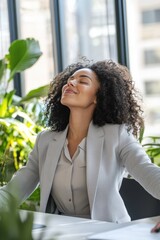Businesswoman enjoying peace and relaxation in office with plants, practicing mindfulness and stress relief, promoting wellness and productivity in corporate workspace.