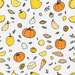 various fruits and vegetables, including lemons, pumpkins, oranges, and apples, arranged in a repeating design against a white background.
