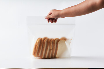 Sliced Bread Being Stored in a Ziplock Bag for Freshness and Convenience