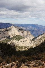 The mountain panorama opening from the hiking path to pick Puig Campana, Finestrat, Benidorm, Spain   