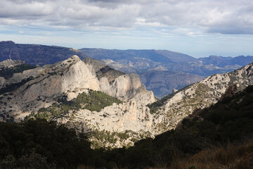 The mountain panorama opening from the hiking path to pick Puig Campana, Finestrat, Benidorm, Spain   