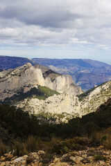 The mountain panorama opening from the hiking path to pick Puig Campana, Finestrat, Benidorm, Spain   