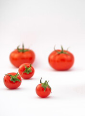 Tomatoes on white background. Isolated tomatoes on white background.