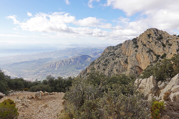 The mountain panorama opening from the hiking path to pick Puig Campana, Finestrat, Benidorm, Spain   