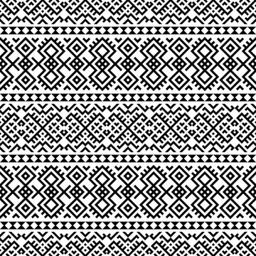 A striking horizontal seamless pattern with intricate tribal-inspired geometric designs in black and white. Great for branding, packaging, and home decor.
