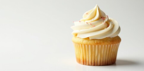 Single vanilla cupcake, frosting swirl, sprinkles, white background, one, background, image