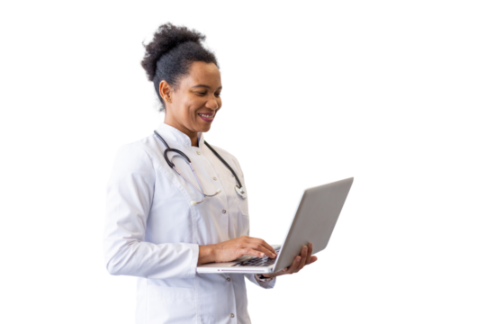 Dedicated African American medical expert working on a laptop while standing