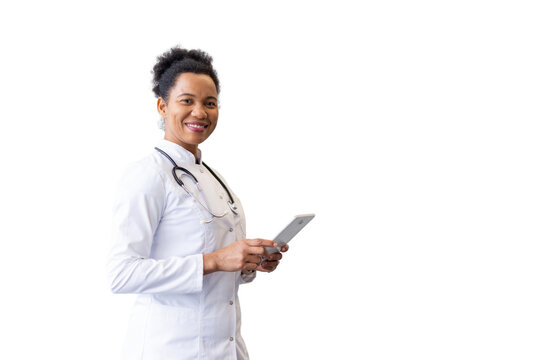 Professional African American doctor analyzing patient data on a tablet