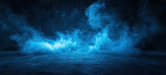 Blue smoke hovering over empty concrete floor in dark room