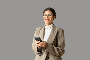 Smiling young middle eastern businesswoman using smartphone mobile phone online ai app for work...