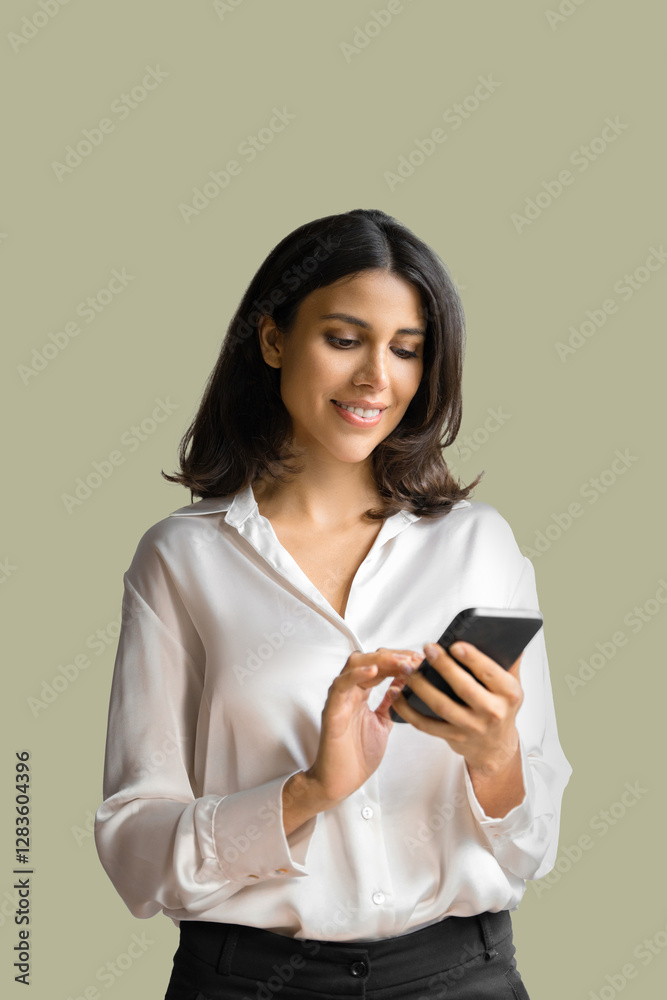 Poster Smiling young middle eastern businesswoman using smartphone mobile phone online ai app for work isolated on white background. Latin woman it specialist in business suit holding cellphone. Vertical