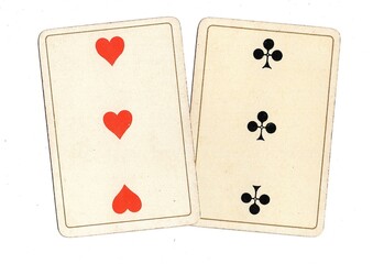 A pair of antique playing cards of the same value on a white background.