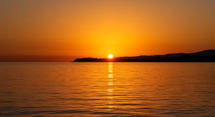 Obraz premium Beautiful sunset on Andaman sea at Windmill View Point near Laem Promthep Cape, Phuket, Thailand