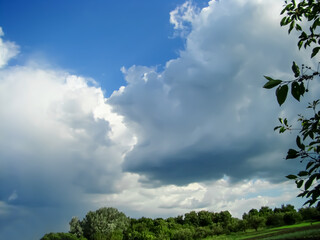 Cumulus clouds before the onset of rainy and windy weather.