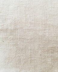 Fototapeta premium Canvas Texture: A close-up shot reveals the subtle weave and textured surface of a light-colored canvas, showcasing the tactile quality of the fabric and its simple, elegant aesthetic.