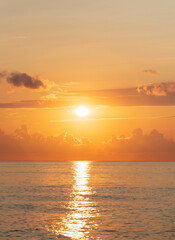 Glowing orange sunset over calm water at Black Sea. Batumui Georgia