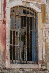 Ancient window and stone arch detail