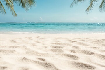 Fototapeta premium Serene White Sand Beach with Turquoise Ocean Under Blue Sky
