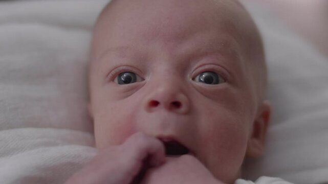 Cute Little Infant Boy Making Faces