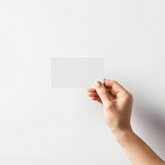 Obraz premium Hand Holding Business Card Blank Mockup, White Visiting Card Clean Minimal Design