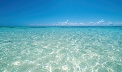 Tranquil Turquoise Ocean Under Bright Blue Sky