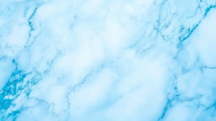 Fototapeta premium smooth, light blue marble texture with subtle white veining, perfect for backgrounds or design elements