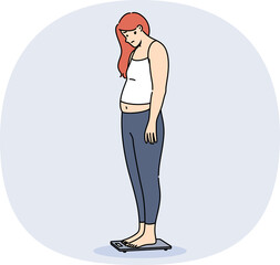 Problem of obesity and weight gain about depressed woman standing on electronic floor scale. Girl...