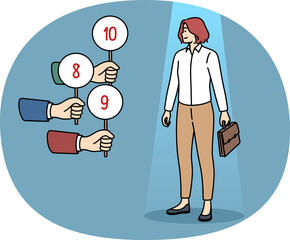 Woman undergoes business interview, receiving marks from recruiters for excellent professional skills. Hands with numbers near girl office manager for job interview concept for vacant position