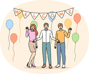 Obraz premium Welcome party from happy family welcoming friends into new apartment with balloons to celebrate move. Welcome party for employee who got job at company and became member of business team