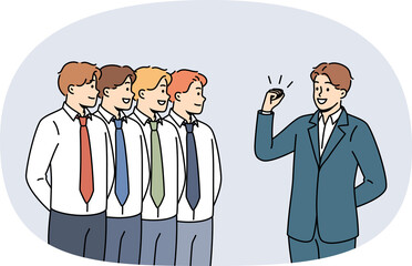 Business man leader gives motivational speech to team of office clerks standing in row. Manager...
