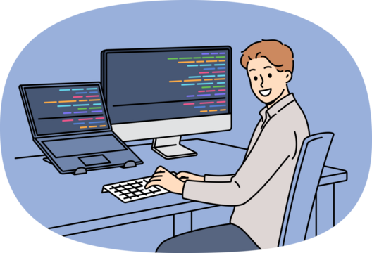 Man programmer types code and looks at camera, sitting at table with computer and laptop. Successful guy programmer develops software or application, working in team with UI or UX designers