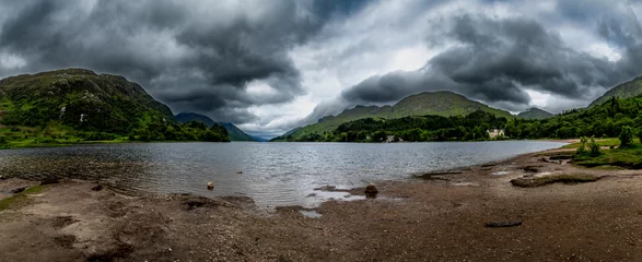 Sandy Beach Of Lake Loch Shiel At Glenfinnan Monument On The Road To The Isles In Lochaber In Scotland, UK