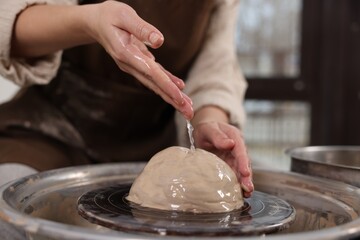Hobby and craft. Woman making pottery indoors, closeup